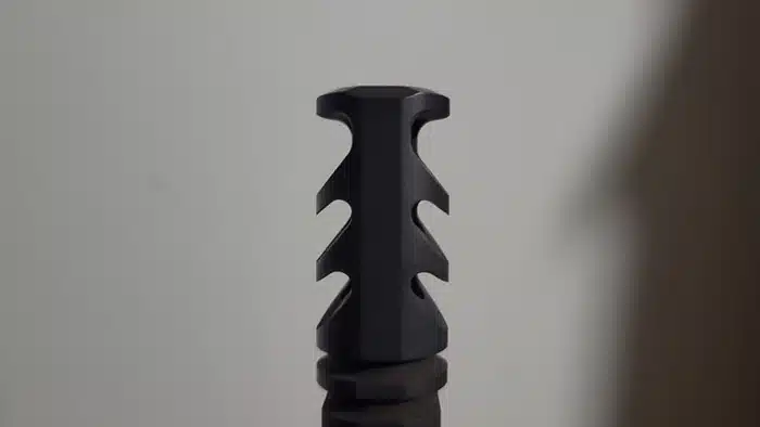 Close up view of the porting on the m4-72 rifle compensator